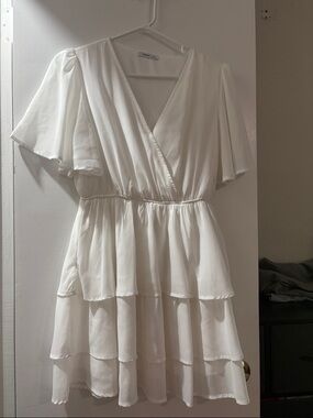 Brand: Unknown — White Tiered Wrap Mini Dress with Flutter Sleeves